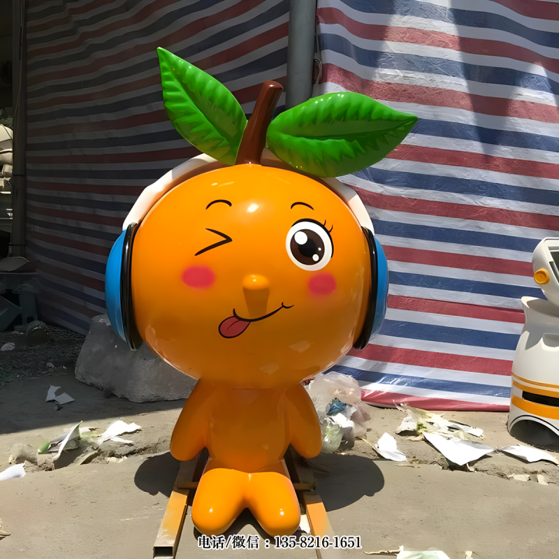 聽音樂的卡通橘子公仔